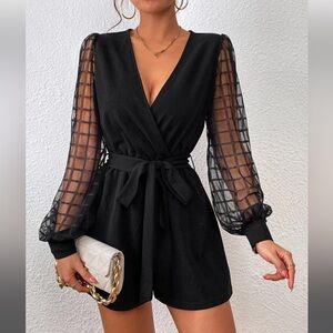 Black romper with mesh sleeves